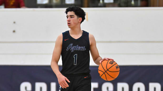 Montgomery junior Xair Mendez dribbles up the court during December's Torrey Pines Holiday Classic